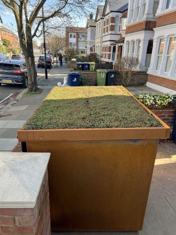 A steel clad bike shed